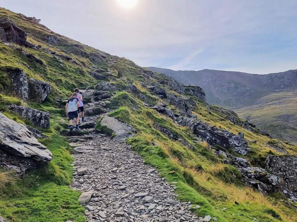 Climbing Snowdon with Kids, frugal mum Snowdon Ranger Path guide, photo of children climbing