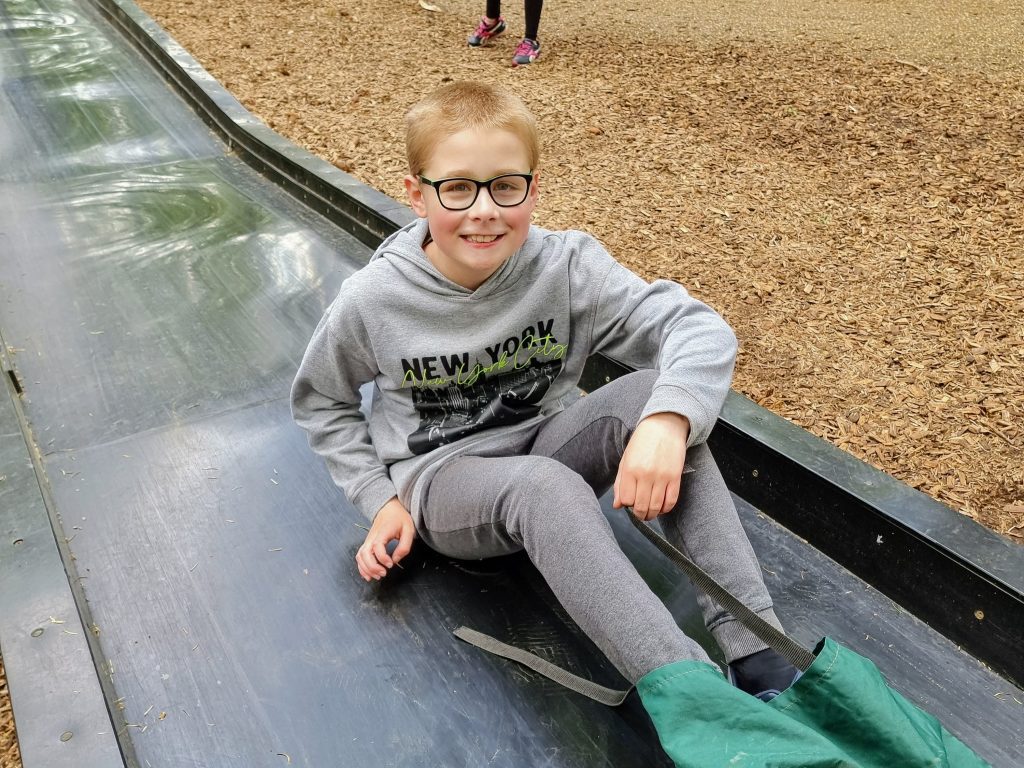 bewilderwood norfolk with kids review, frugal mum guide, photo of child on slide