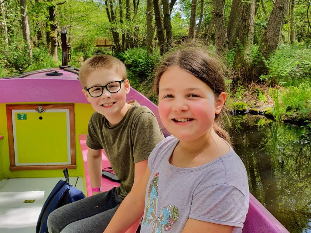 bewilderwood norfolk with kids review, frugal mum guide, photo of children on boat
