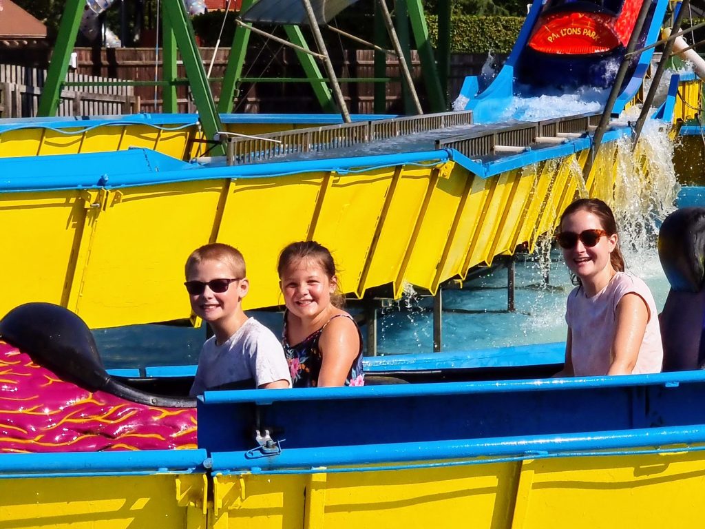 The 12 best places to stay near Paultons Park / Peppa Pig World, frugal mum guide, photo of family on paultons park log flume