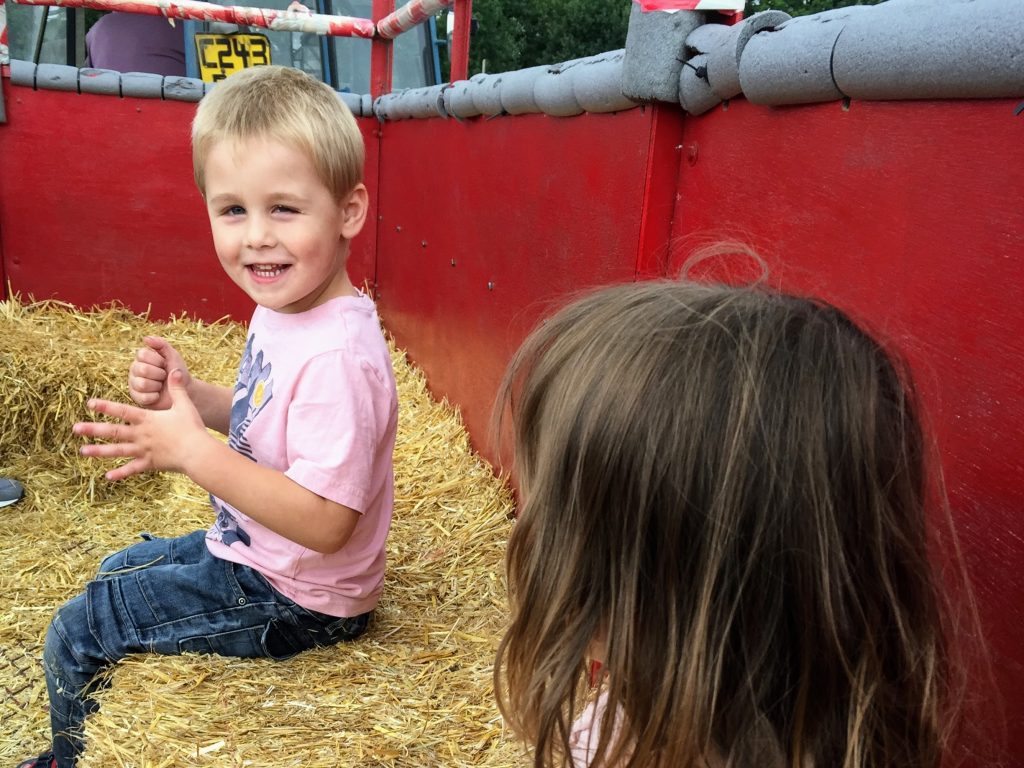 Kent with Kids, Rare Breeds Centre Review, Woodchurch, frugal mum guide, photo of children on tractor ride