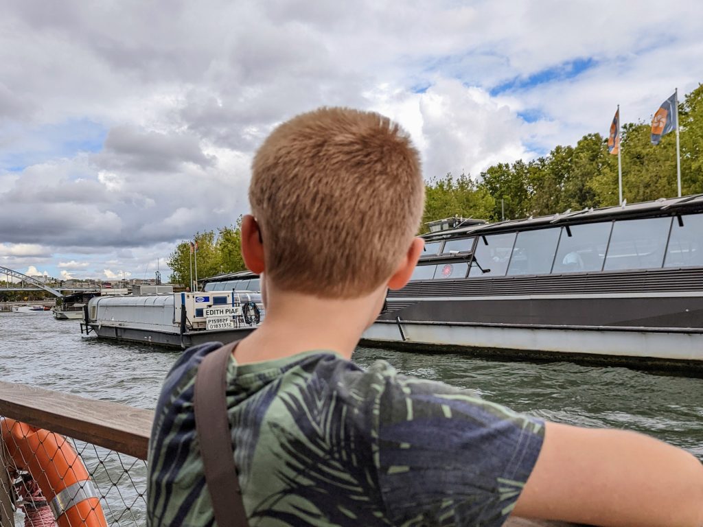 How to have a city break in Paris on a budget with kids, photo on boat ride river seine
