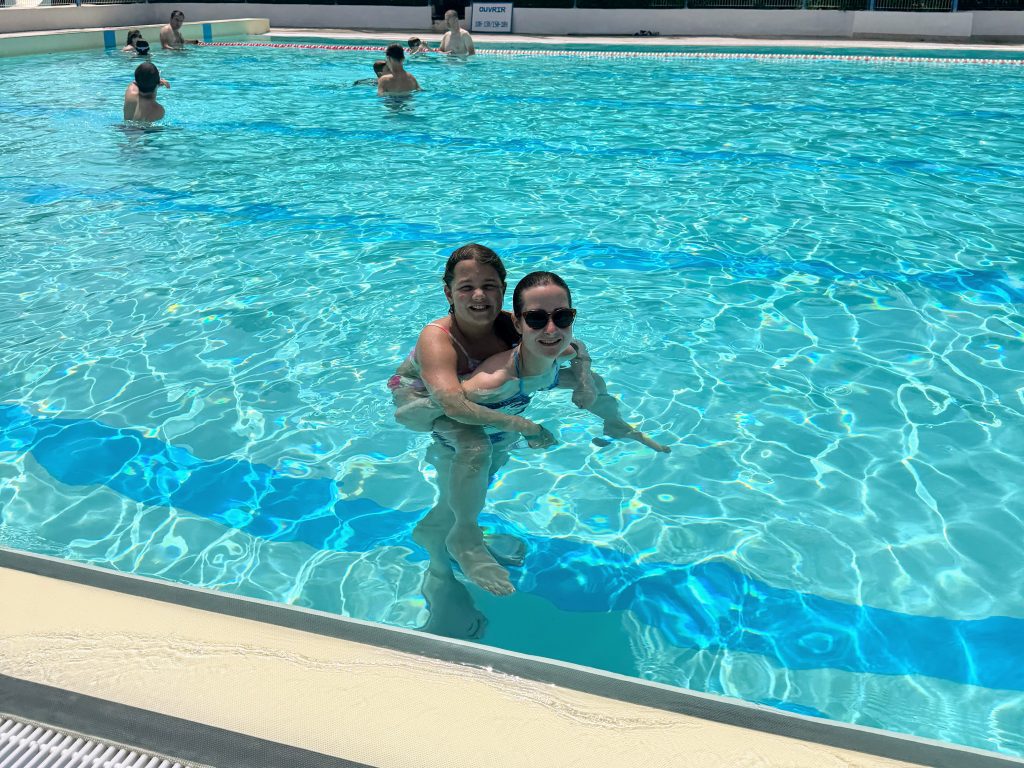 best eurocamp south of france, photo of frugal mum and child in swimming pool at domaine des naiades