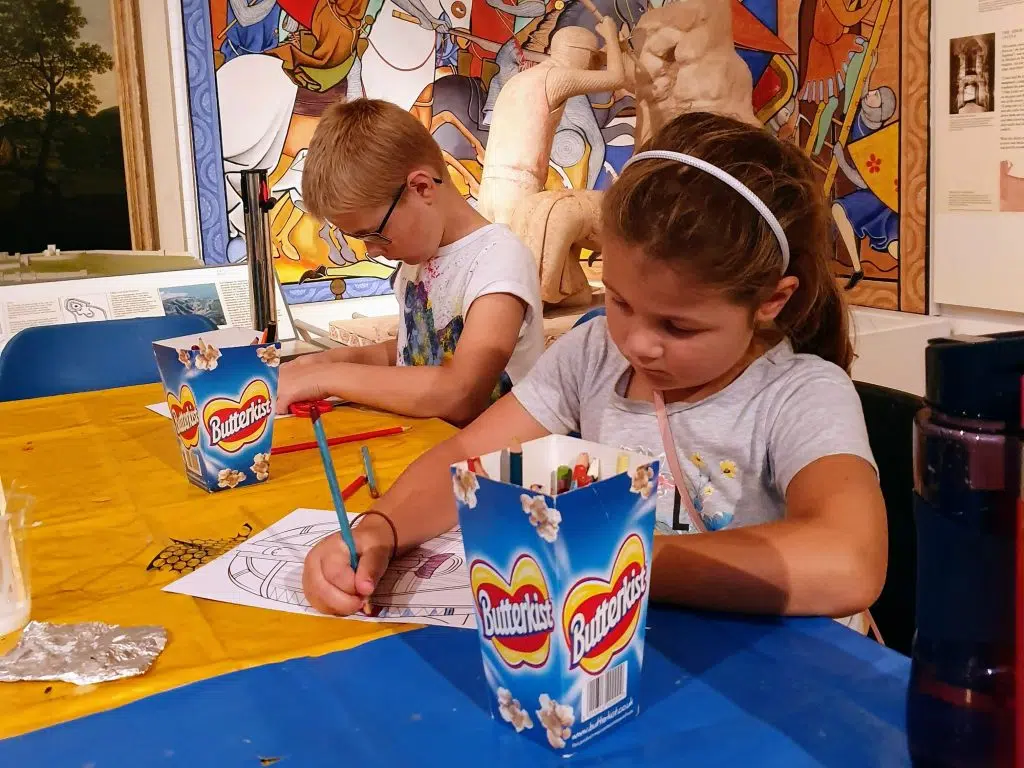 cheap days out with the kids, weekend, school holidays budget family fun guide, frugal mum, photo of children crafting