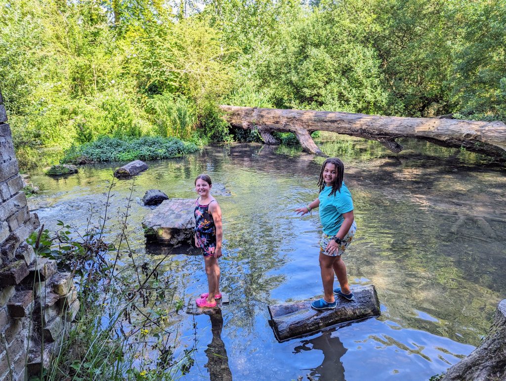 Kent with Kids: Kearsney Abbey and Russell Gardens, Dover, free day out, frugal mum photo of kids in stream