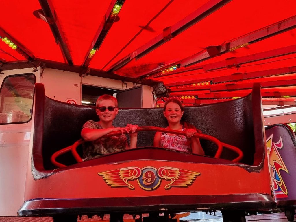 The Ultimate Butlins Minehead Holiday Guide & Review, frugal mum photo of children on rides