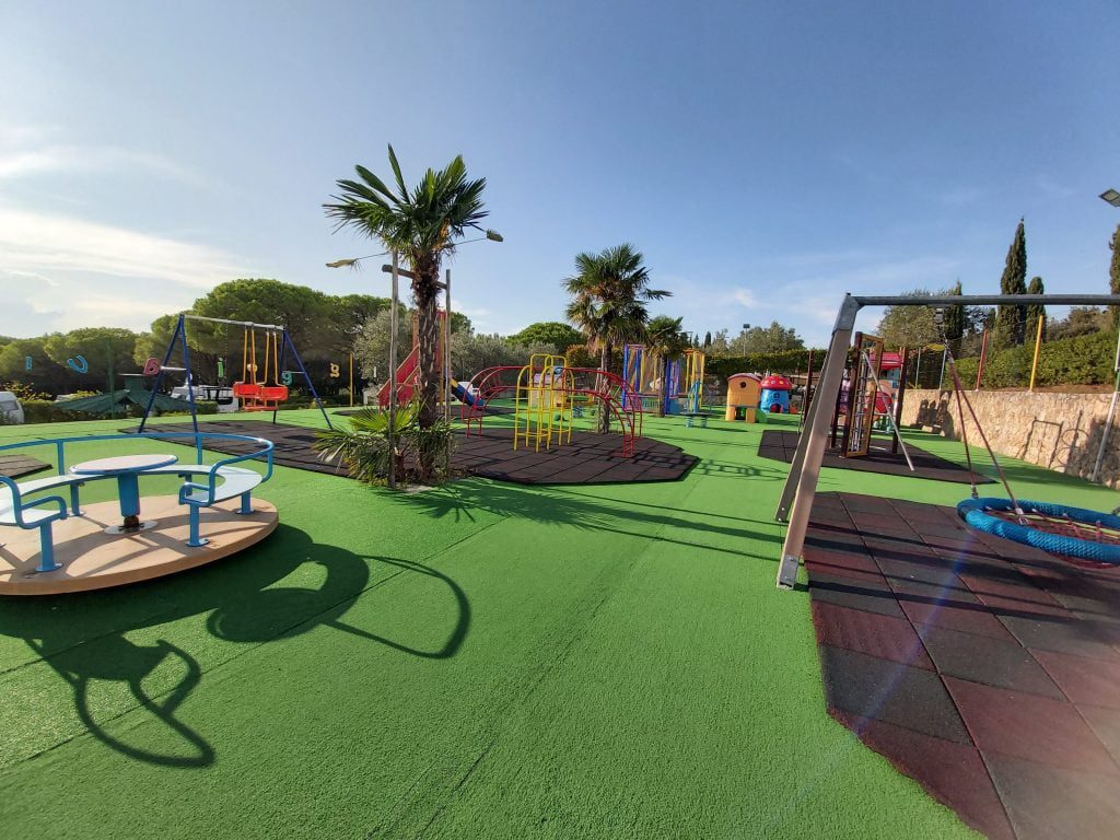 why eurocamp to travel in europe with kids, frugal mum guide, photo of la valle gaia tuscany playground