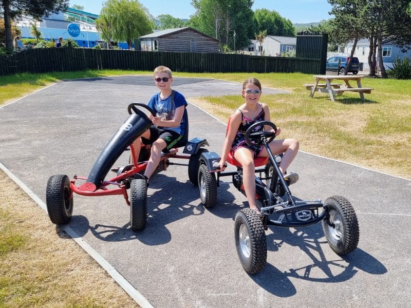 The Ultimate Butlins Minehead Holiday Guide & Review, frugal mum photo of children on rides