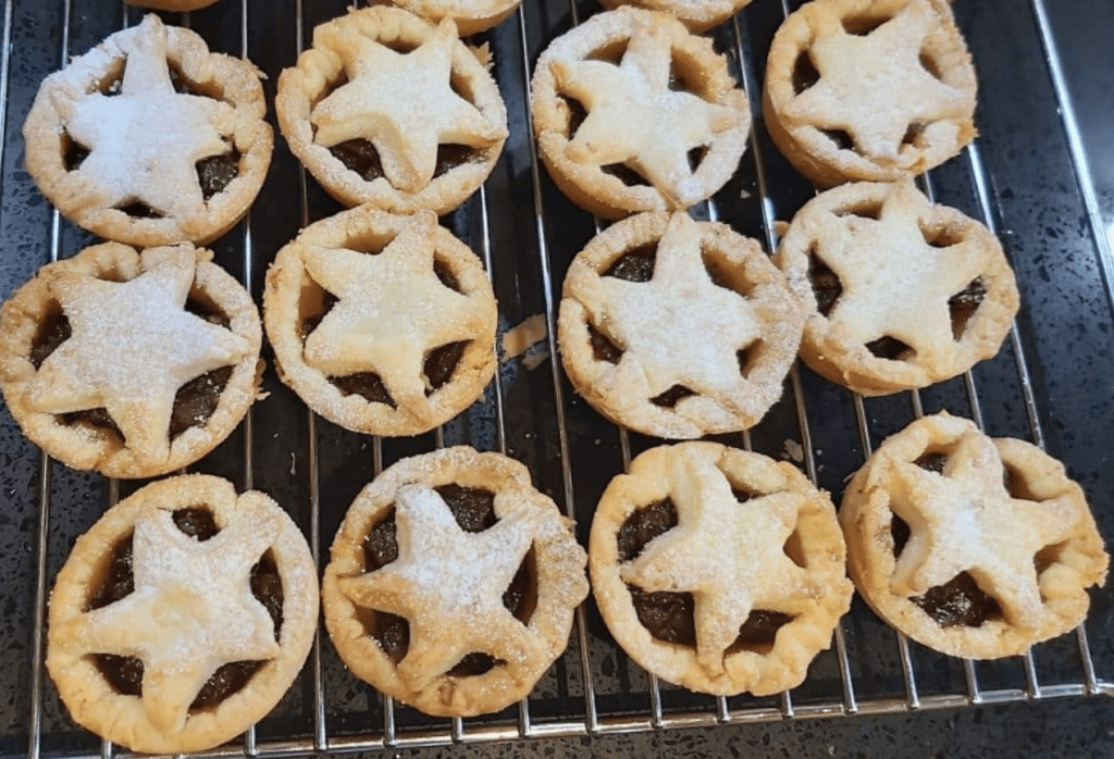 Christmas without money: 30 tips for a DIY budget family Christmas, homemade star mince pies cooling on rack