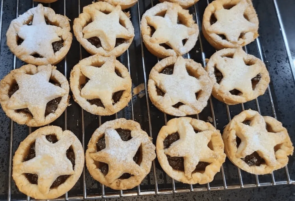 Christmas without money: 30 tips for a DIY budget family Christmas, homemade star mince pies cooling on rack