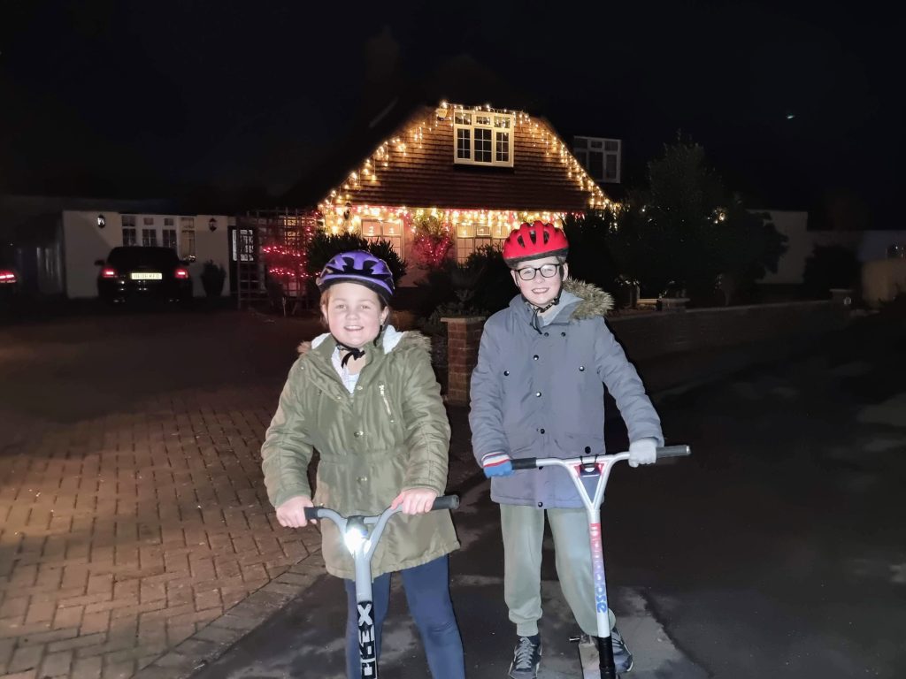 christmas without money, budget DIY christmas ideas, frugal mum photo of children on scooters