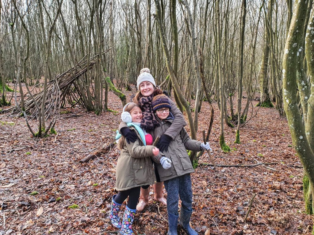 Christmas on a budget, Cheap festive family days out with the kids, photo of frugal mum kid in woods