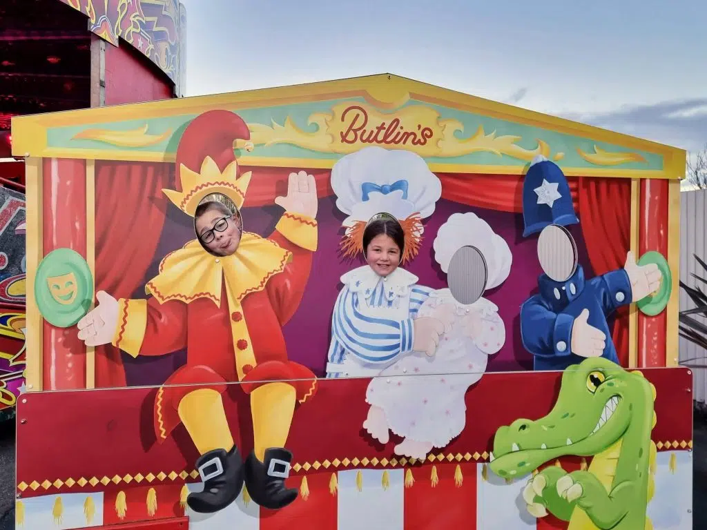 butlins bognor regis review, minehead, frugal mum family, children posing in Butlins sign, photo