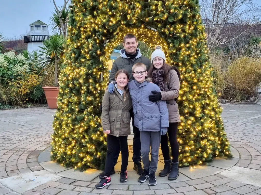 butlins bognor regis minehead review, frugal mum family by christmas tree, photo