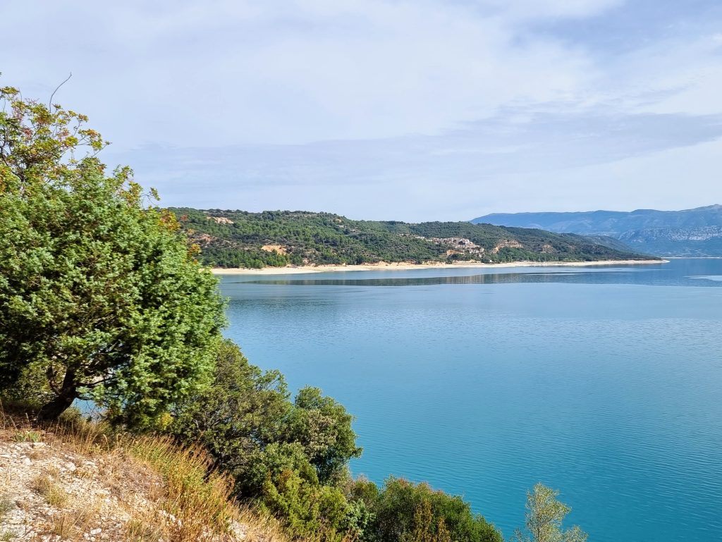 How to road trip on a budget around Europe, the ultimate family guide, frugal mum tips, photo of lake in france