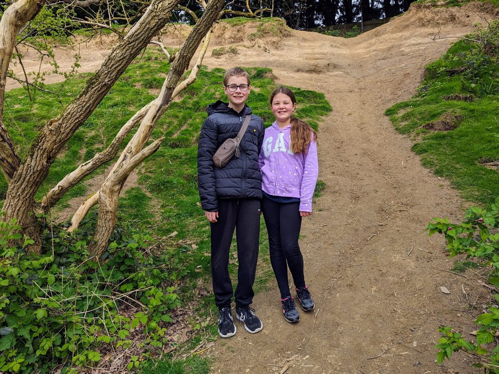 Kent with Kids, Brockhill Country Park Review, Hythe, free day out, frugal mum guide, photo of children on hills