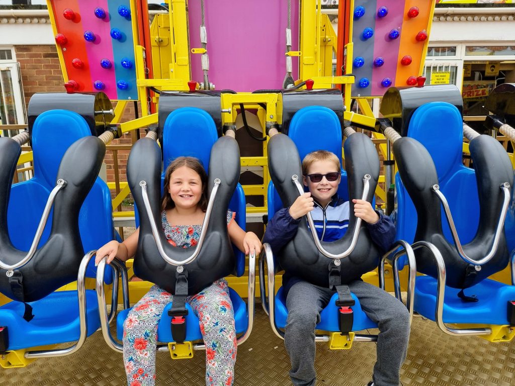 Free Day Out with the Kids, dymchurch beach, Kent, frugal mum photo of children at amusements