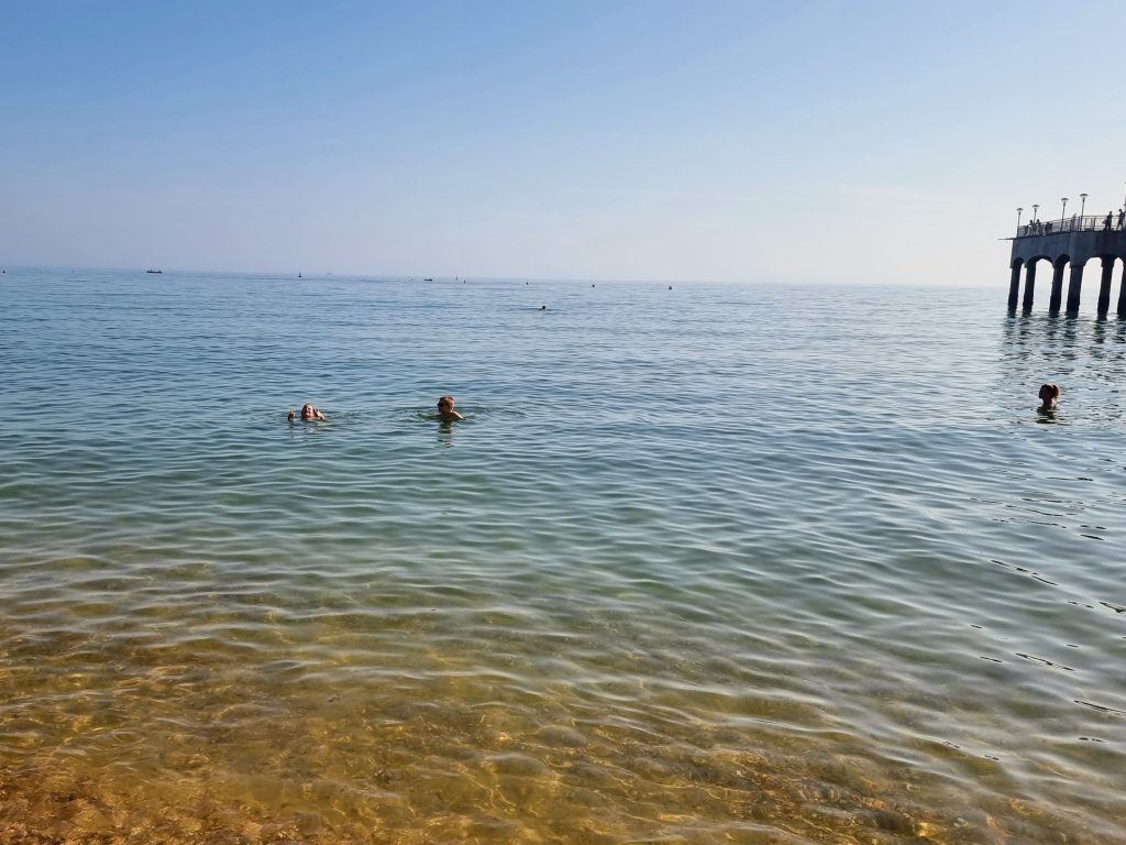 New Forest with Kids, Away Resorts Sandy Balls Holiday Park Review, frugal mum guide, photo of swimming at bournemouth beach