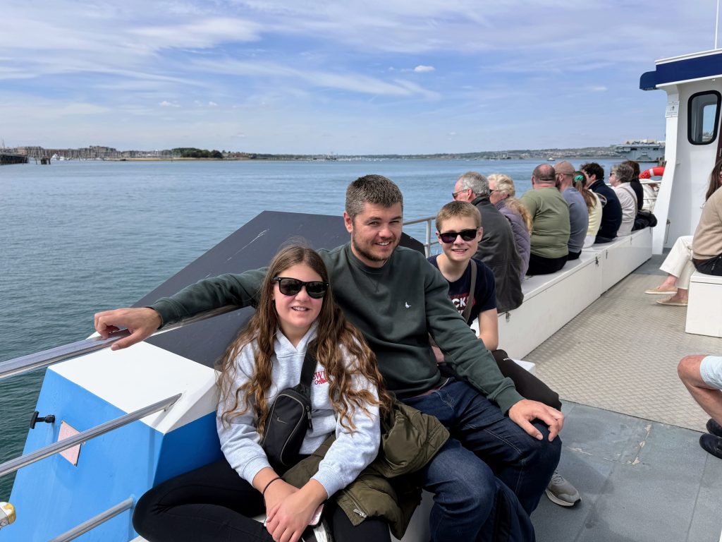 Portsmouth Historic Dockyard with Kids, the ultimate family guide from frugal mum, photo of family on portsmouth harbour boat tour