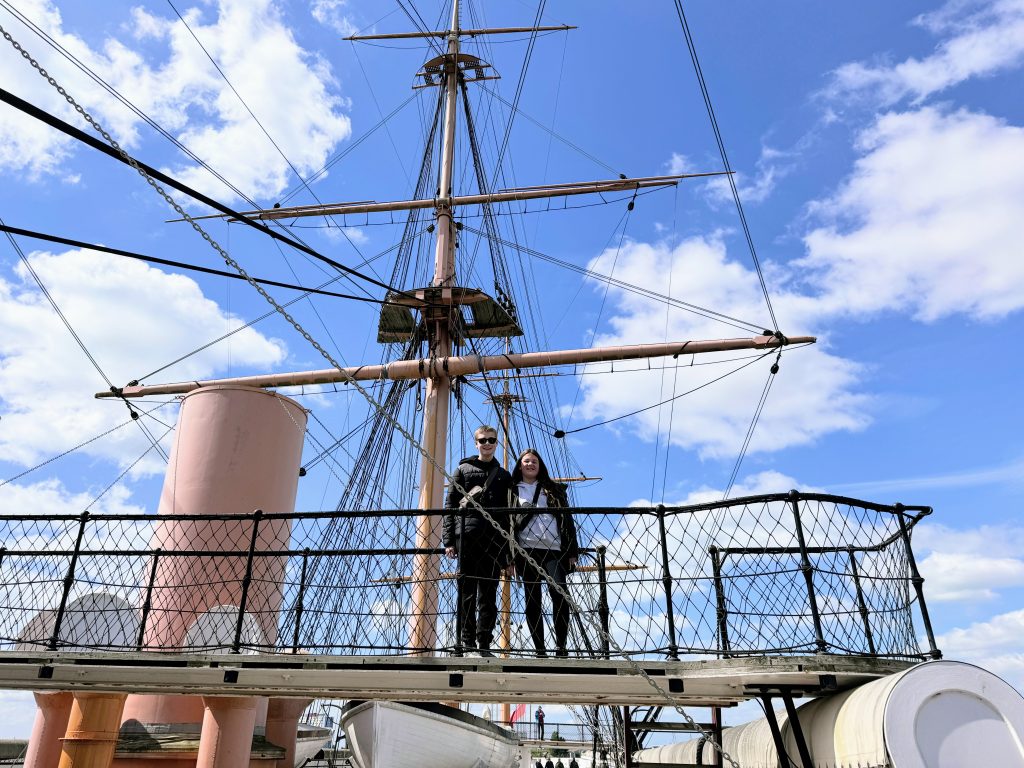 Portsmouth Historic Dockyard with Kids, the ultimate family guide from frugal mum, photo of kids on HMS warrior deck