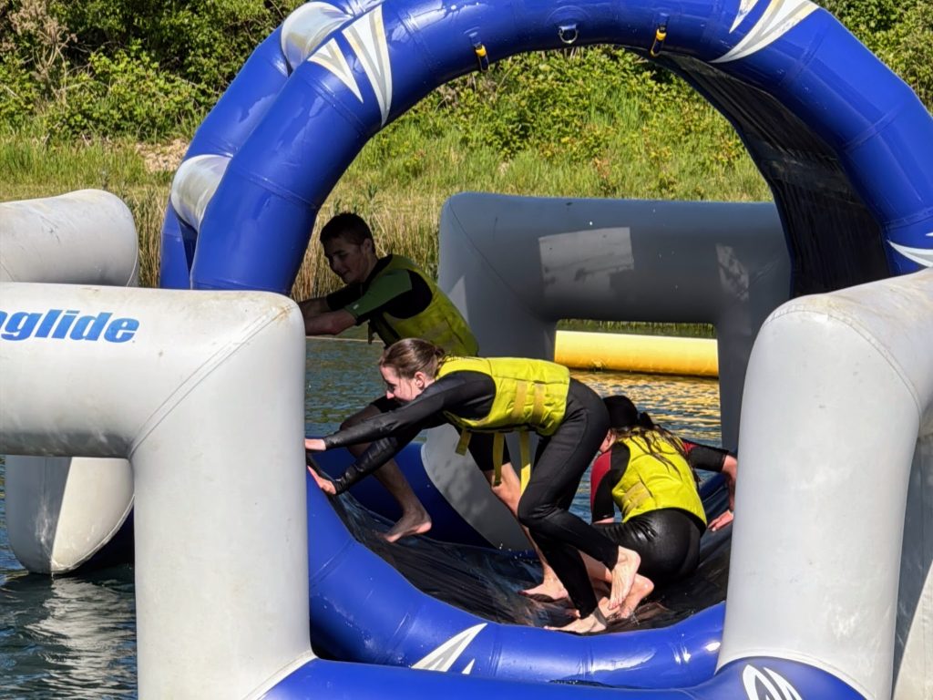 North Devon Wake Park with kids - our aqua park review, frugal mum guide, photo of family on lake