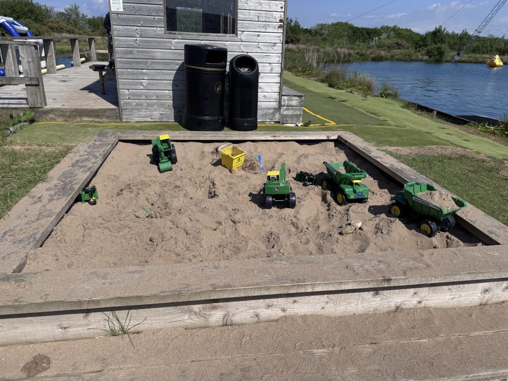North Devon Wake Park with kids - our aqua park review, frugal mum guide, photo of sand pit toddler area