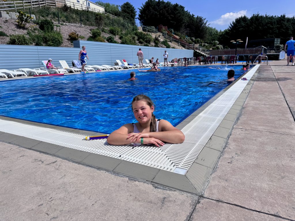 North Devon with Kids, Woolacombe Bay and Twitchen House Holiday Park Review, frugal mum, photo of child in pool