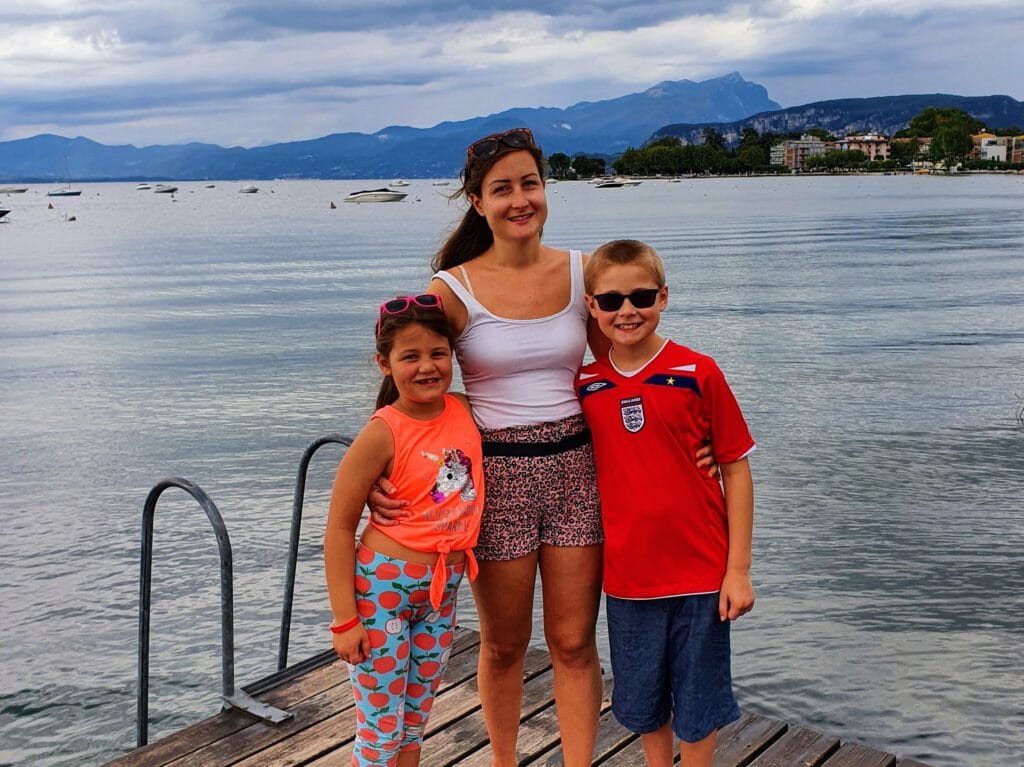 Eurocamp Holiday Review, cisano san vito, lake garda italy, frugal mum travel guide, photo of family by lake