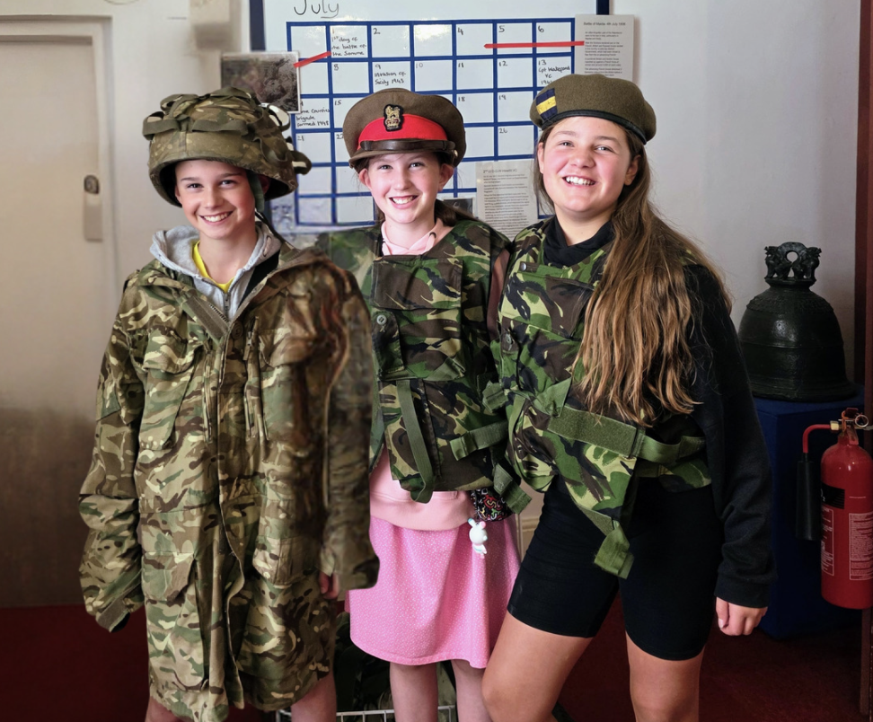 Visiting Dover Castle with kids, a fun family day out guide, frugal mum photo of children dressed up in WW2 museum
