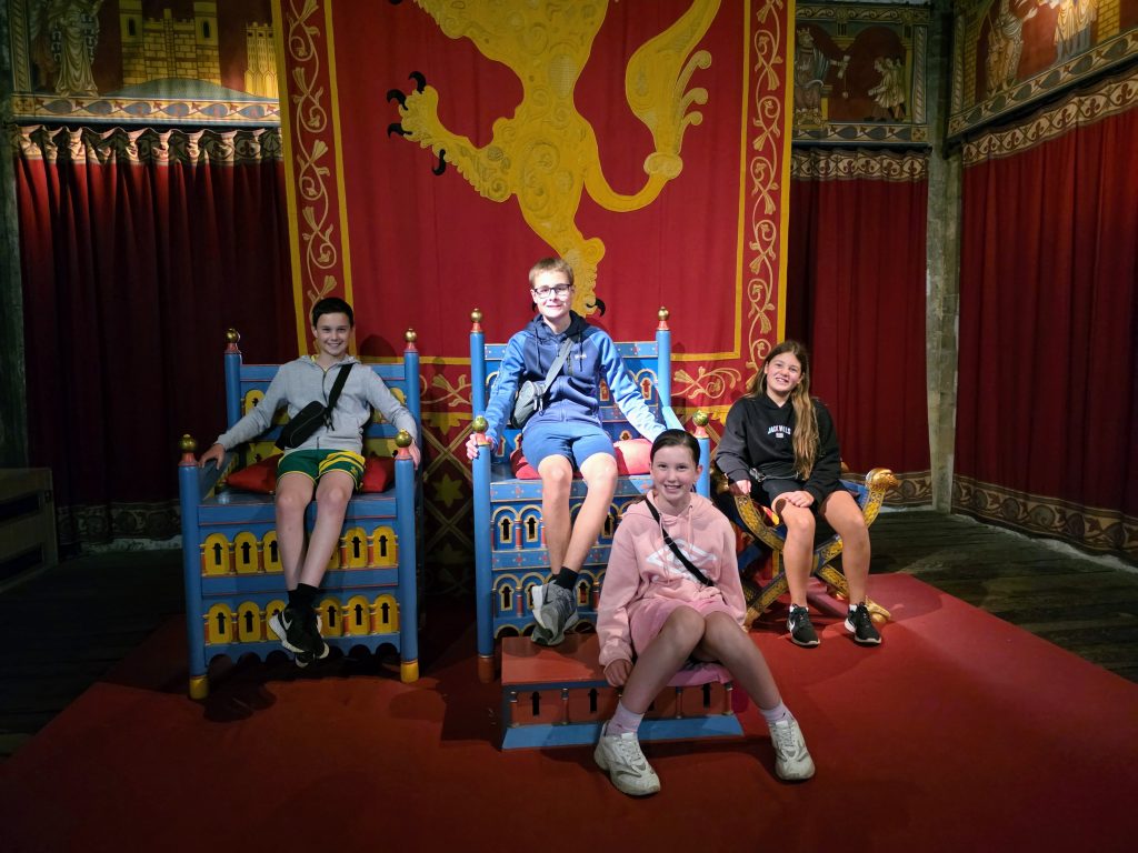 Visiting Dover Castle with kids, a fun family day out guide, frugal mum photo of children in throne room the great tower