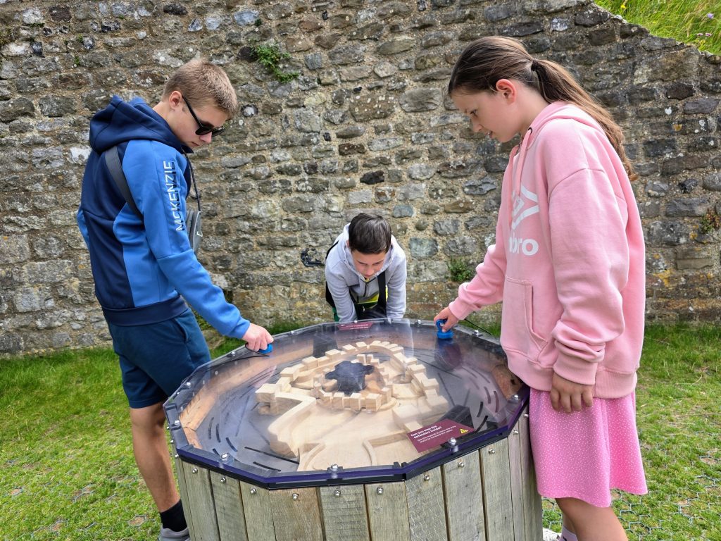 Visiting Dover Castle with kids, a fun family day out guide, frugal mum photo of children playing game