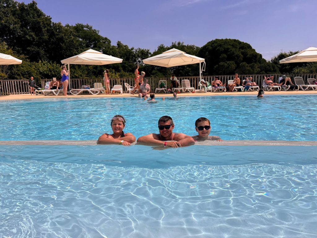 Eurocamp Holiday Review, Le Pin Parasol, Vendée, France, frugal mum travel guide, photo of family in pool