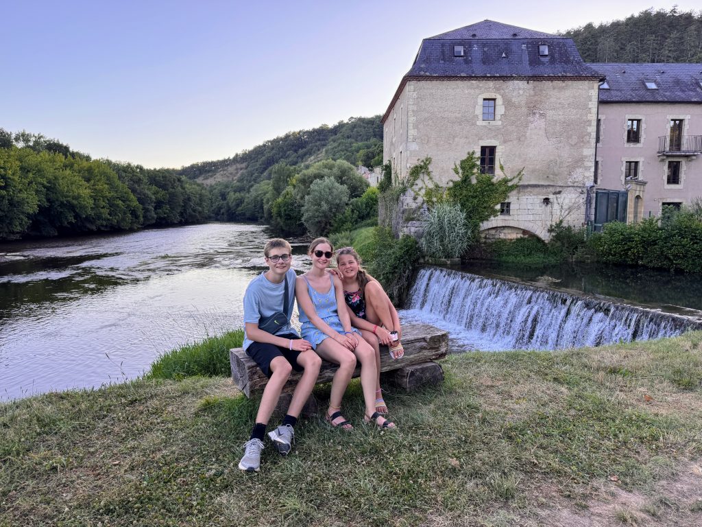Which Eurocamp resorts in France are near airports, frugal mum family travel guide, photo of family in Dordogne