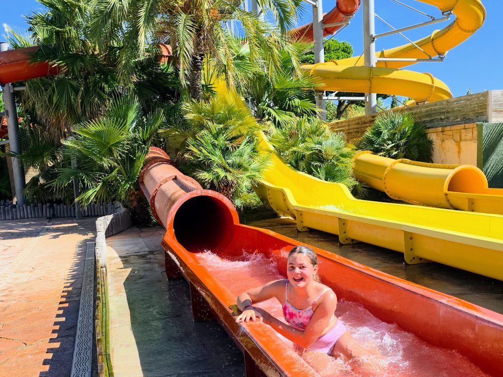 why eurocamp to travel in europe with kids, frugal mum guide, photo of waterslides at la sirene