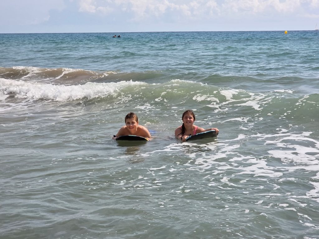 Eurocamp Spain, The 5 best holidays on the Costa Brava, frugal mum travel guide, photo of kids in sea