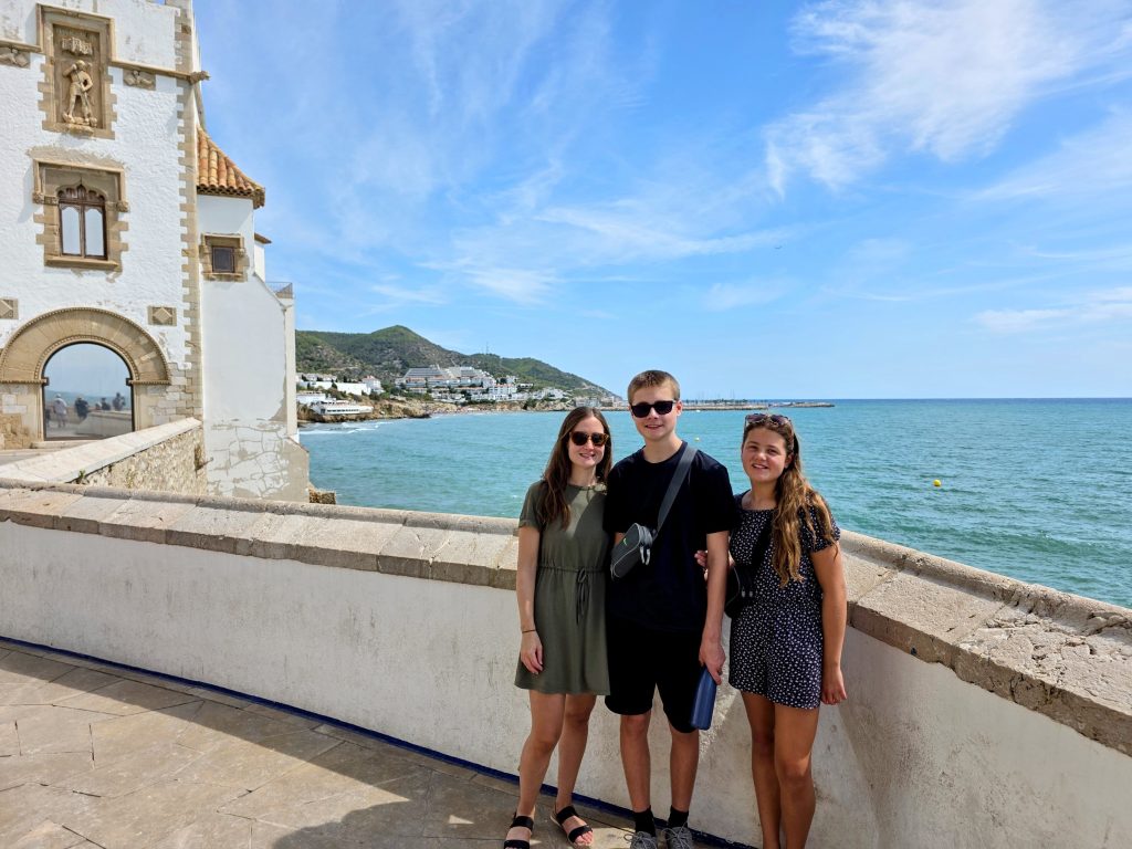 Which Eurocamp resorts in Spain are near airports, frugal mum travel guide, photo of family in sitges