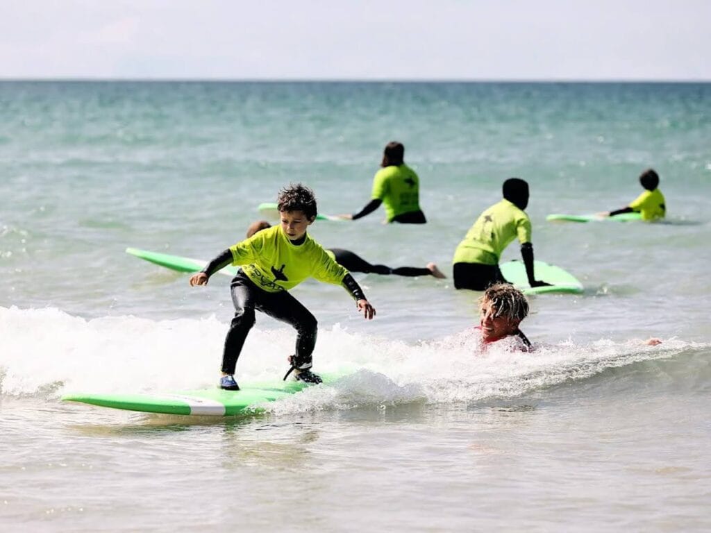 Best Things to Do in Cornwall with Kids, frugal mum travel guide, photo of surfing