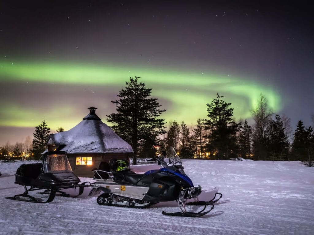 frugal mum northern lights rovaniemi travel guide, photo of snowmobile aurora safari