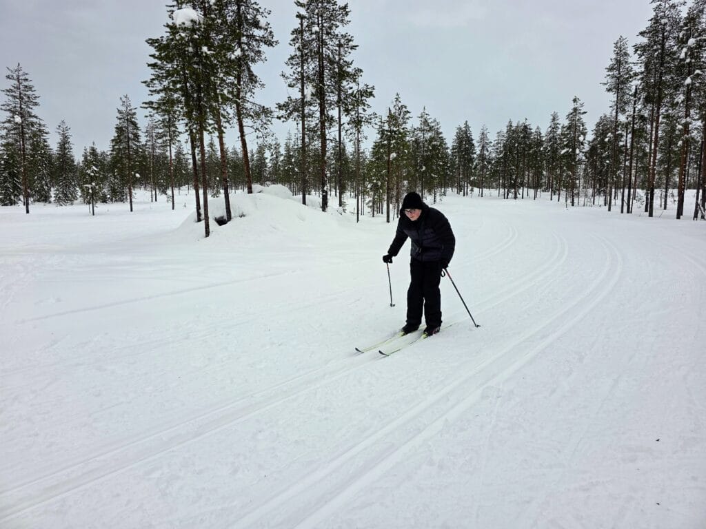 Best things to do in Rovaniemi with teenagers, frugal mum lapland travel guide, photo of child cross country skiing lapland winter park