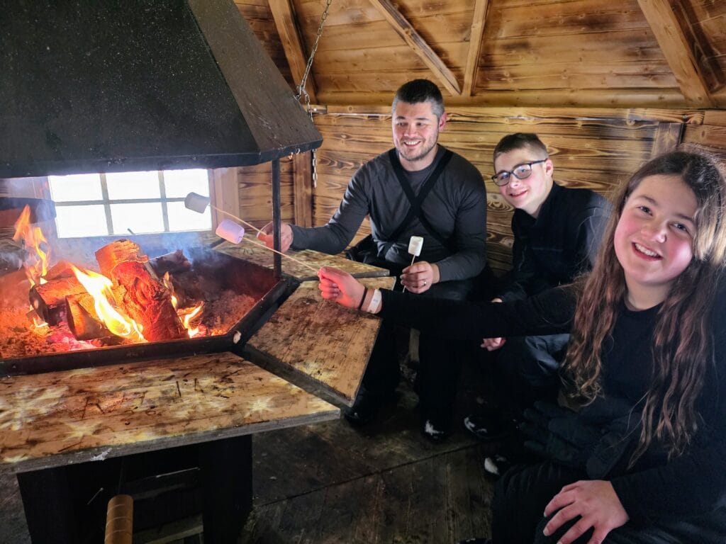 Lapland Winter Park Rovaniemi worth visiting with kids, frugal mum travel guide, photo of toasting marshmallows