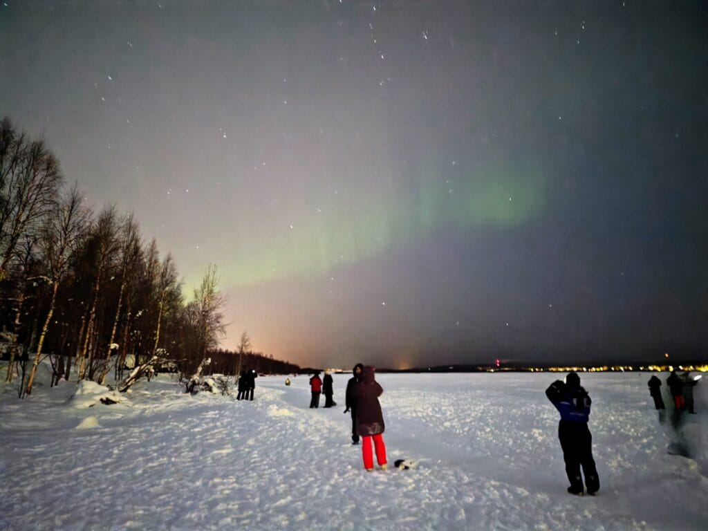 best places to see the Rovaniemi Northern Lights without a tour, frugal mum travel guide, photo of arctic garden aurora 