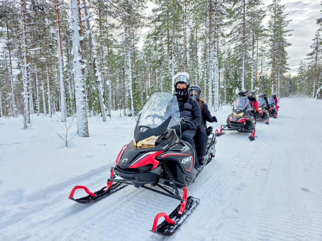 3 days in Rovaniemi with kids the perfect lapland family itinerary, frugal mum finland travel guide, photo of snowmobile safari nordicunique