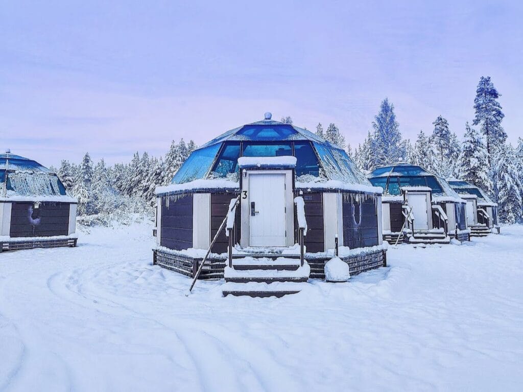 Where to stay in Rovaniemi with kids, the best hotels, apartments igloos, frugal mum travel guide, image of arctic snowhotel and glass igloos