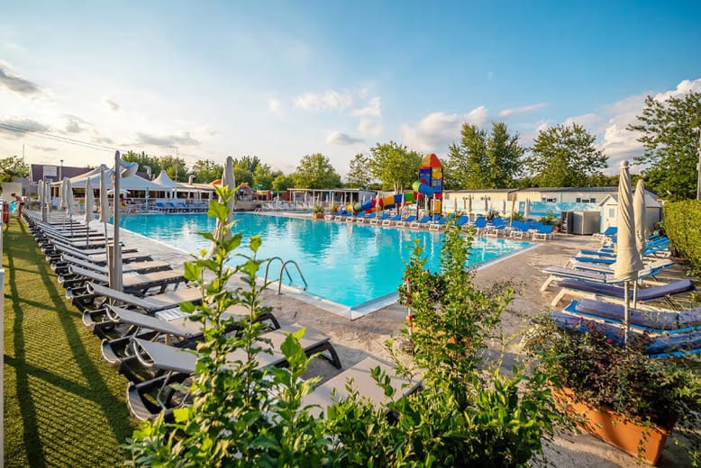 Eurocamp without a car, best car free holidays near an airport, frugal mum travel guide, photo of camping village butterfly, lake garda, italy