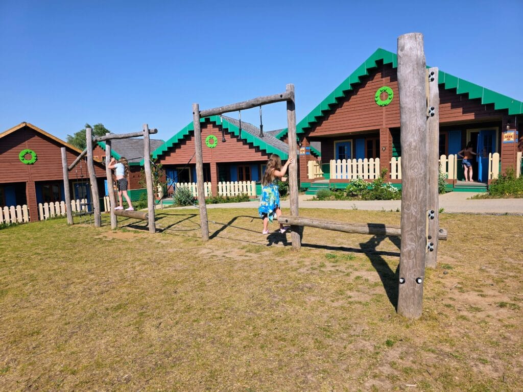 LEGOLAND Windsor Hotel and woodland village lodges review, frugal mum guide, photo of children playing