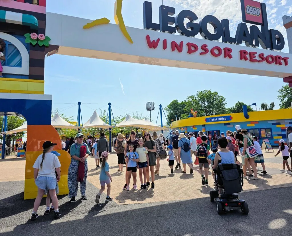 Ultimate Family Guide for LEGOLAND Windsor, frugal mum review, photo of family at entrance