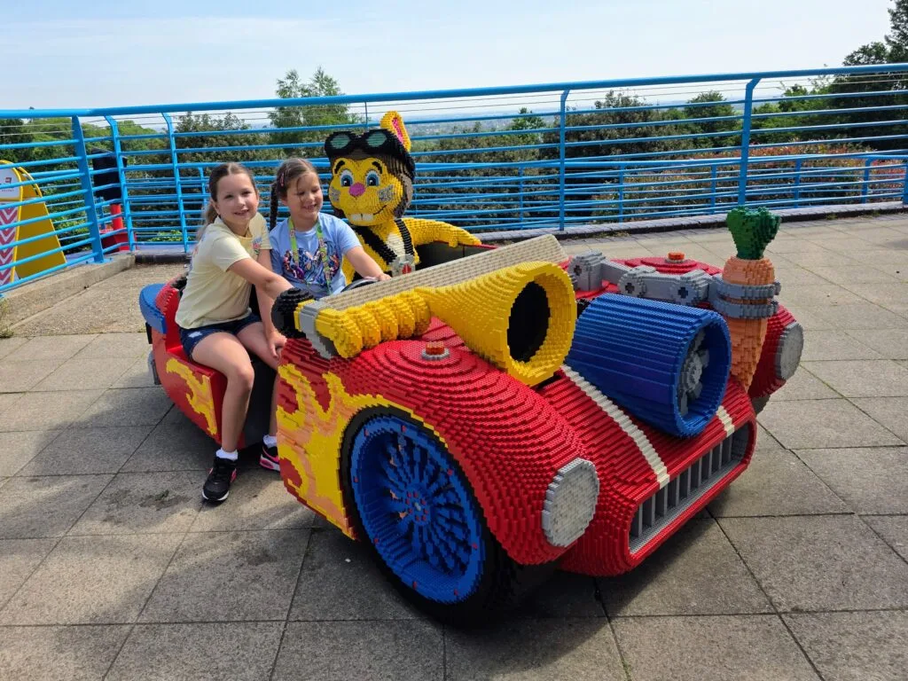Ultimate Family Guide for LEGOLAND Windsor, frugal mum review, photo of children on lego car
