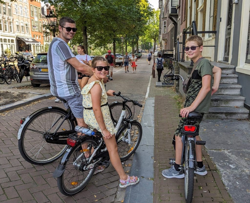 Amsterdam photo, reasons to visit netherlands with kids, frugal mum photo and article, kids on bikes