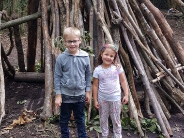 Kent with Kids, Bedgebury National Pinetum Review, Goudhurst, frugal mum children playing wooden den