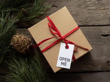 christmas gift wrapped in brown paper